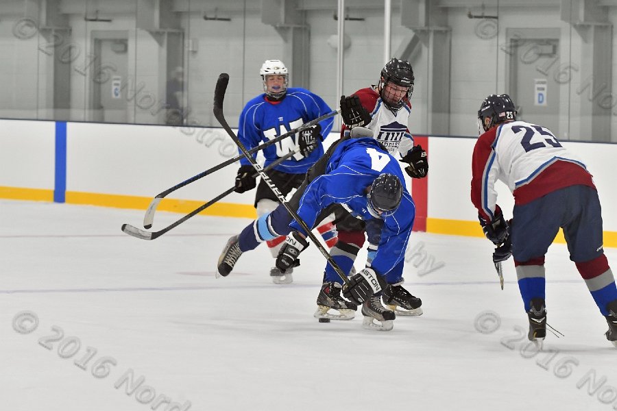 Wheaton College Men\'s Ice Hockey vs Middlesex Community College. - Photo By: KEITH NORDSTROM